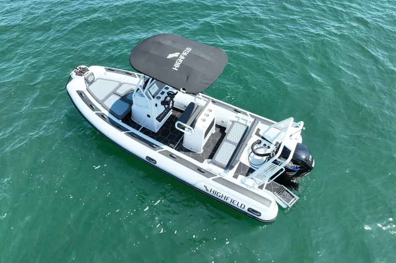 Slide: The Image of 2026 Highfield Sport 560 boat on open water, featuring sleek design and modern amenities. - 3
