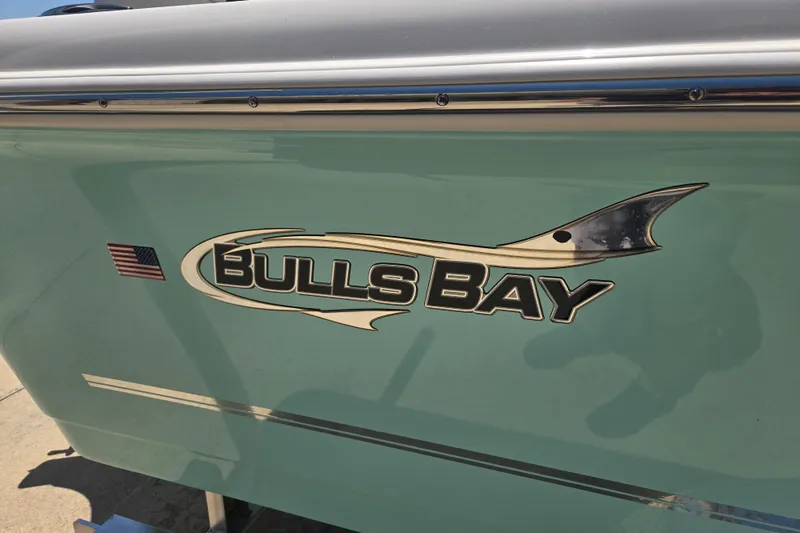 Slide: The Image of Bulls Bay 2000 boat logo with American flag, 2026 model. - 15