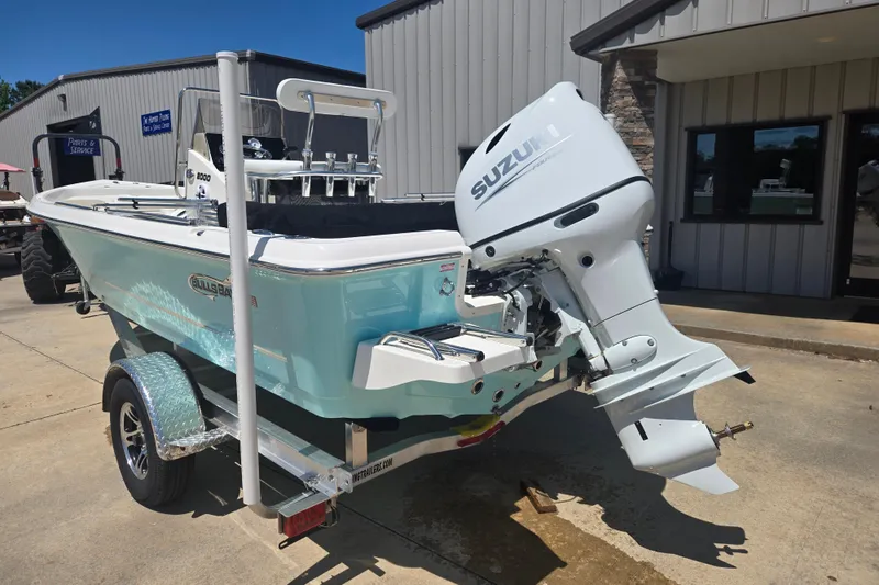 Slide: The Image of 2026 Bulls Bay 2000 boat with Suzuki outboard motor on a trailer. - 17