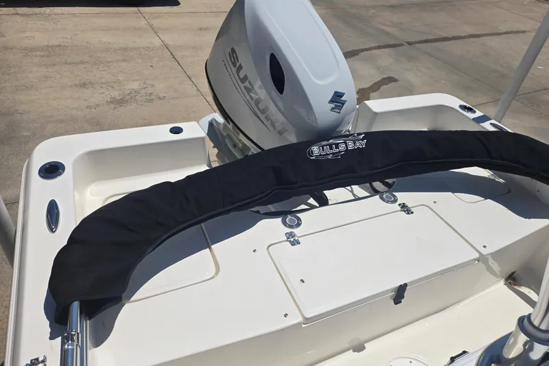 Slide: The Image of 2026 Bulls Bay 2000 boat with Suzuki outboard motor, rear deck view. - 8
