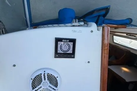 Slide: The Image of 1985 Sabre 32 sailboat cockpit with B&G navigation display and speaker. - 18