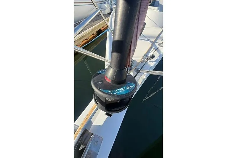 Slide: The Image of Furling system on 1985 Sabre 32 sailboat, docked at marina. - 4