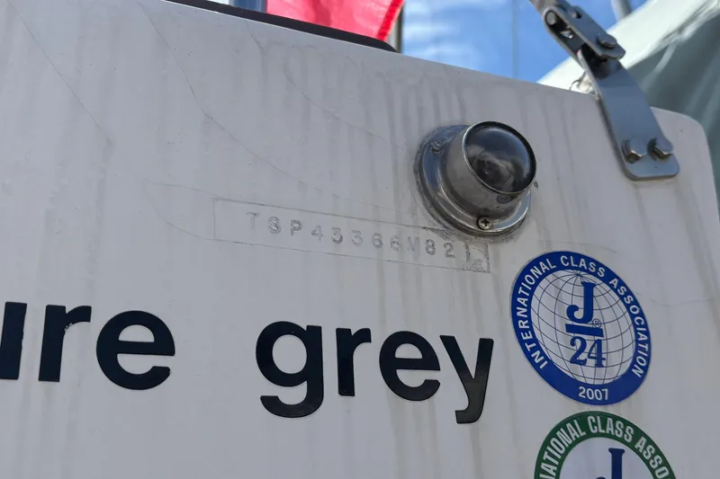 Slide: The Image of 1982 J Boats J/24 sailboat with International Class Association sticker. - 6