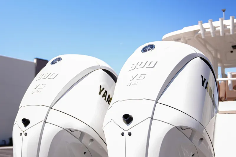 Slide: The Image of Twin Yamaha 300 V6 engines on a 2024 NauticStar 292 Legacy boat. - 11