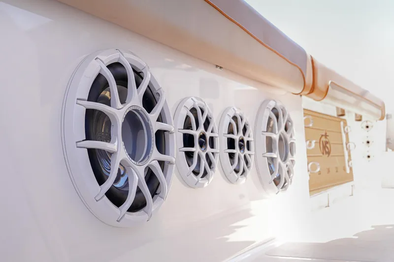 Slide: The Image of 2024 NauticStar 292 Legacy boat speakers and seating detail. - 18