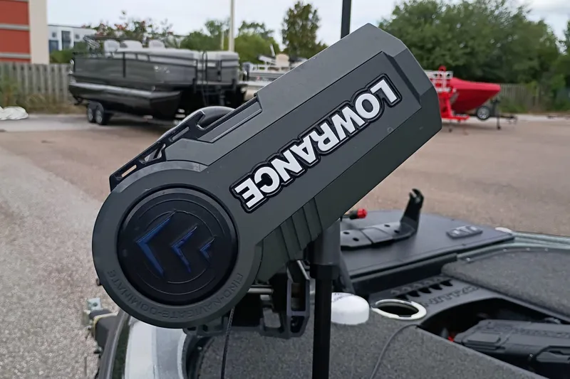 Slide: The Image of Lowrance device on 2024 Nitro Z19 Pro boat, parked outdoors. - 3