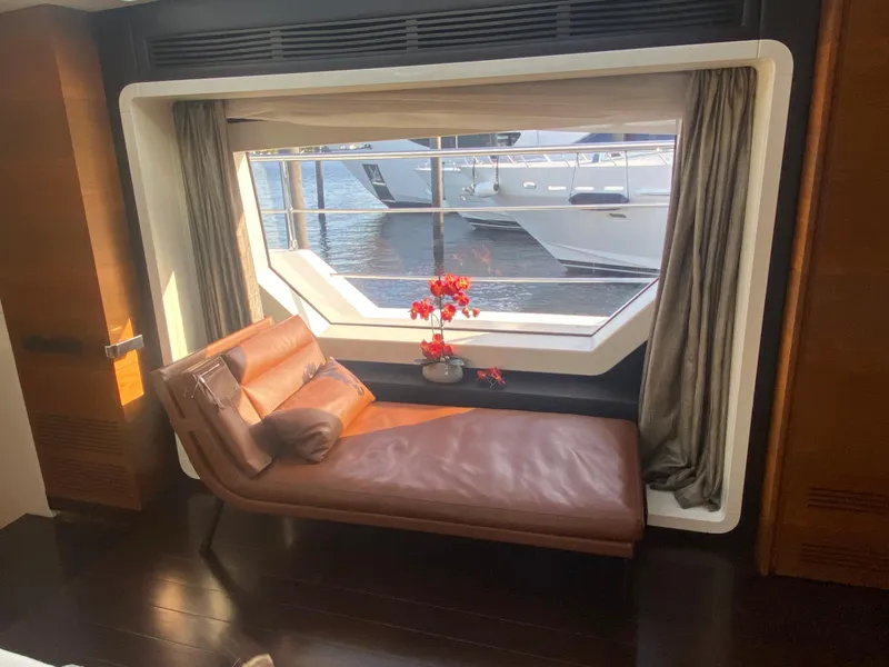 Slide: The Image of Luxurious interior of 2014 Azimut 100 Grande yacht with leather chaise lounge and large window. - 22