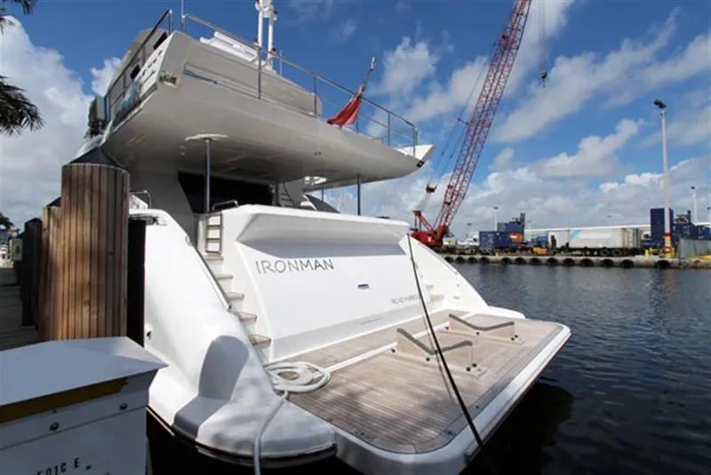 Slide: The Image of 2014 Azimut 100 Grande yacht docked at marina. - 9