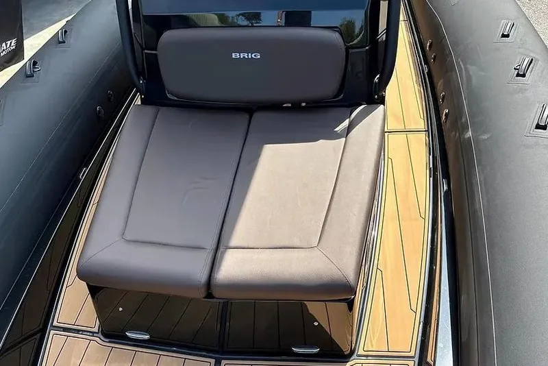 Slide: The Image of Manufacturer Provided Image: 2026 Brig Eagle 10 boat with cushioned seating and sleek design. - 3