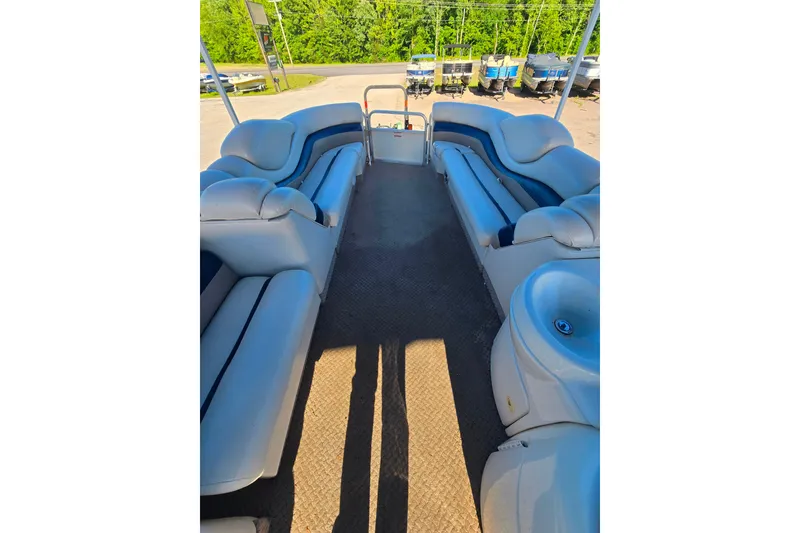 Slide: The Image of Interior view of a 2005 Lowe Jamaica 250SD pontoon boat with plush seating. - 10