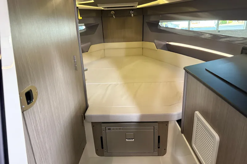 Slide: The Image of Interior of 2026 Navan S30 boat with modern cabin and cozy sleeping area. - 6