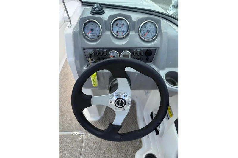 Slide: The Image of Steering wheel and dashboard of 2012 Chaparral 18 H2O Sport boat. - 12