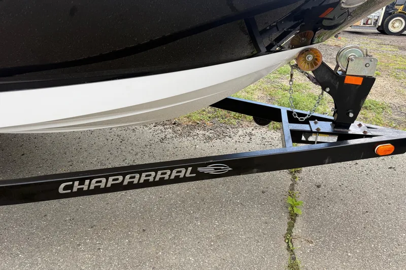 Slide: The Image of 2012 Chaparral 18 H2O Sport boat on trailer, close-up view. - 27