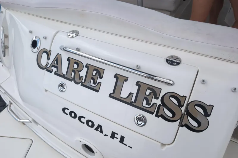 Slide: The Image of 2005 Sea Ray Sundancer 280 boat with "CARE LESS" name, Cocoa, FL location. - 11
