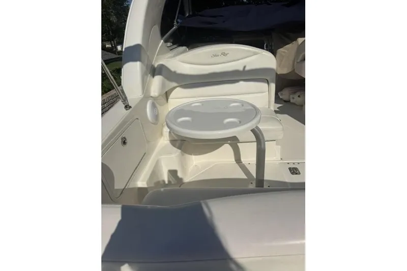 Slide: The Image of 2005 Sea Ray Sundancer 280 boat interior with seating and table. - 17