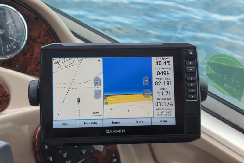 Slide: The Image of Garmin GPS display on 2005 Sea Ray Sundancer 280, showing speed and navigation details. - 64