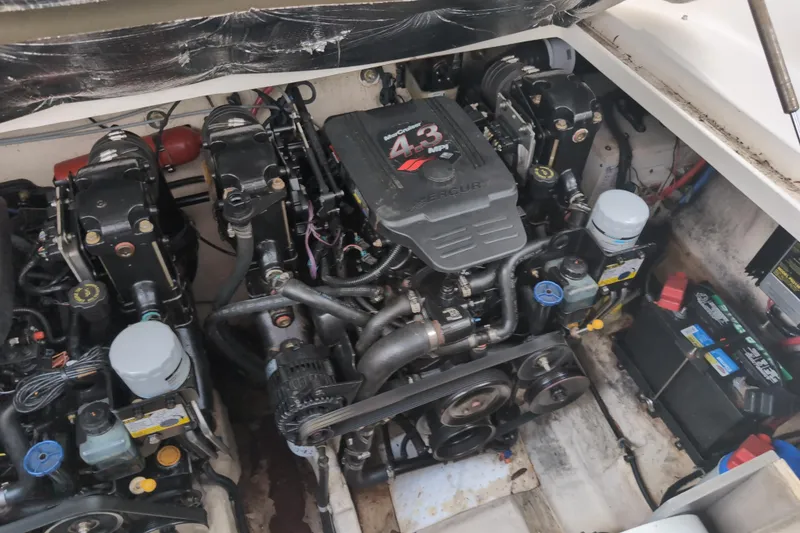 Slide: The Image of Engine compartment of a 2005 Sea Ray Sundancer 280 with dual MerCruiser 4.3 MPI engines. - 66