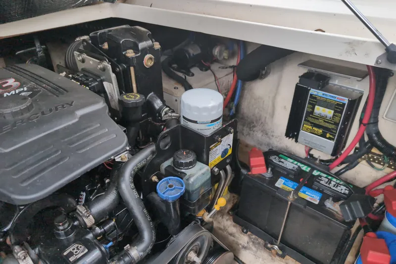 Slide: The Image of Engine compartment of a 2005 Sea Ray Sundancer 280 with Mercury 3.0 MPI engine. - 67