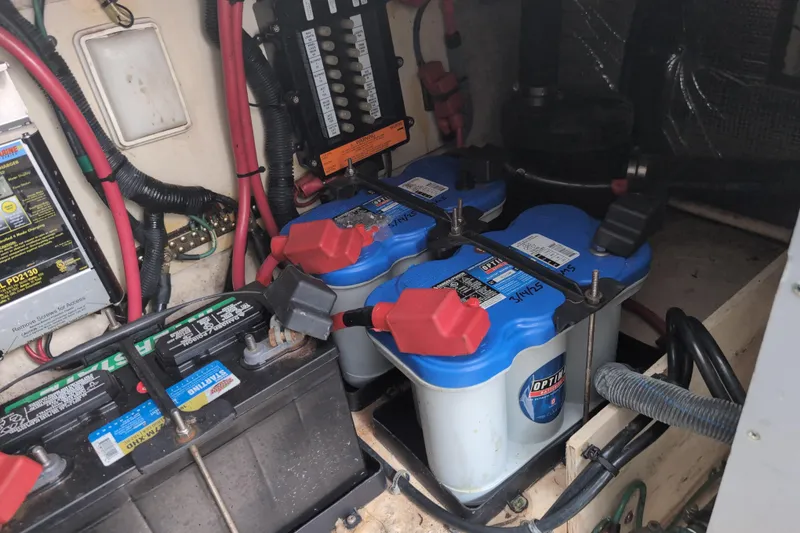 Slide: The Image of Battery compartment of a 2005 Sea Ray Sundancer 280 boat with Optima batteries. - 68