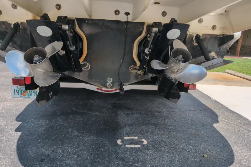 Slide: The Image of Rear view of a 2005 Sea Ray Sundancer 280 with dual propellers. - 73