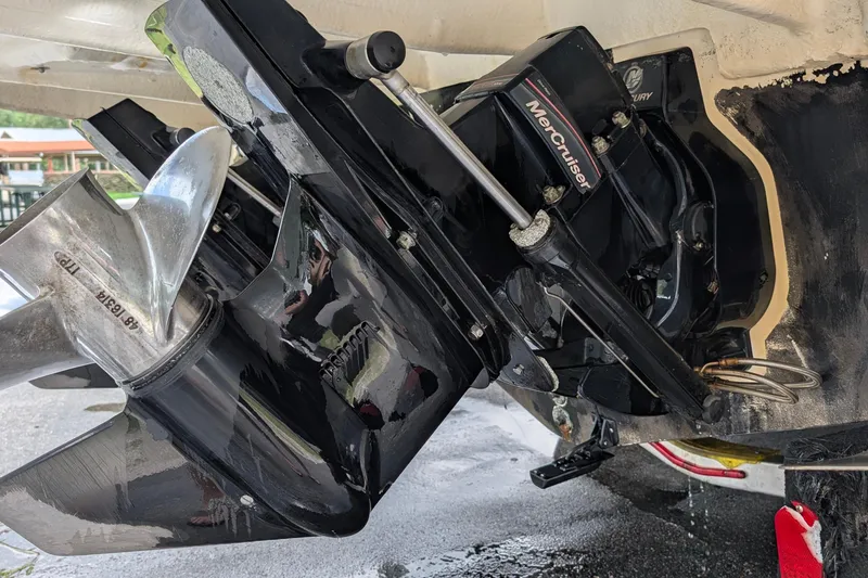 Slide: The Image of Close-up of a 2005 Sea Ray Sundancer 280 MerCruiser engine and propeller. - 76