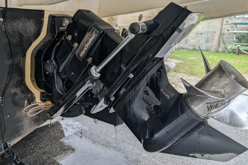 Slide: The Image of Close-up of a 2005 Sea Ray Sundancer 280 MerCruiser engine and propeller. - 77