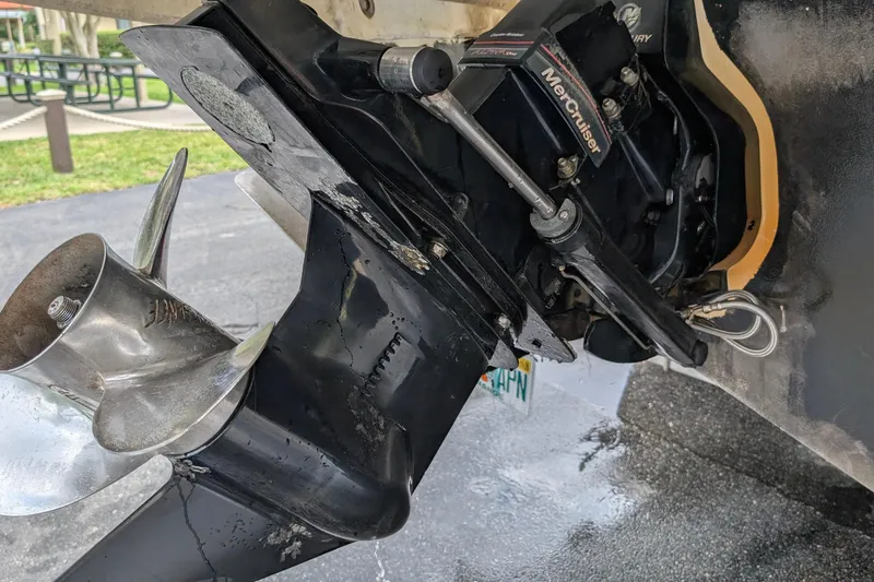 Slide: The Image of Close-up of a 2005 Sea Ray Sundancer 280 MerCruiser engine and propeller. - 78