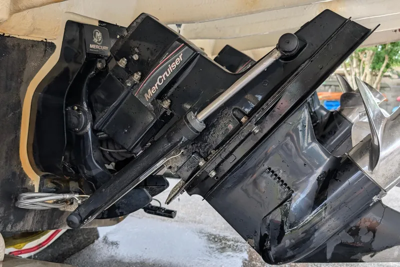 Slide: The Image of Close-up of a 2005 Sea Ray Sundancer 280 MerCruiser engine and propeller system. - 79
