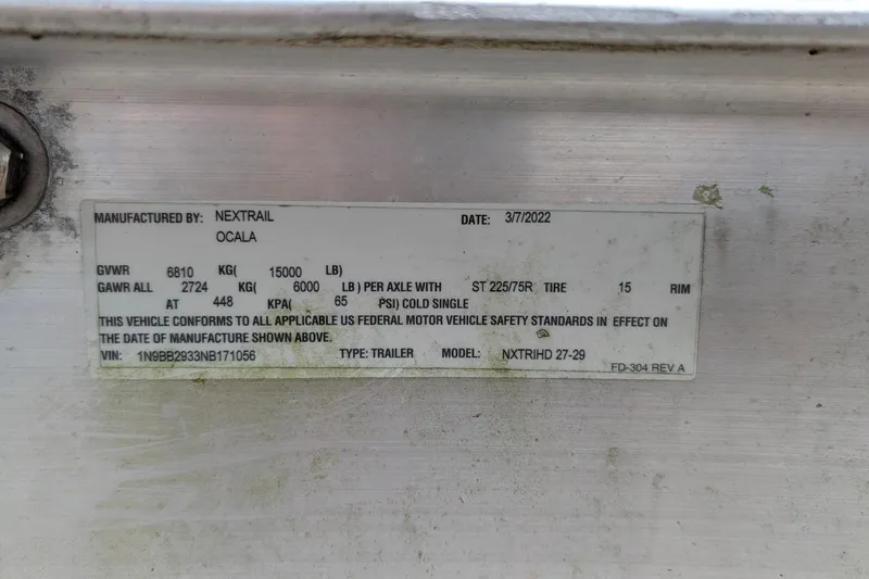 Slide: The Image of Label on Nextrail trailer, manufactured in Ocala, dated 3/7/2022, with specifications. - 92