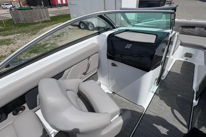 Slide: The Image of 2023 Four Winns HD3 boat interior with sleek seating and modern design. - 10