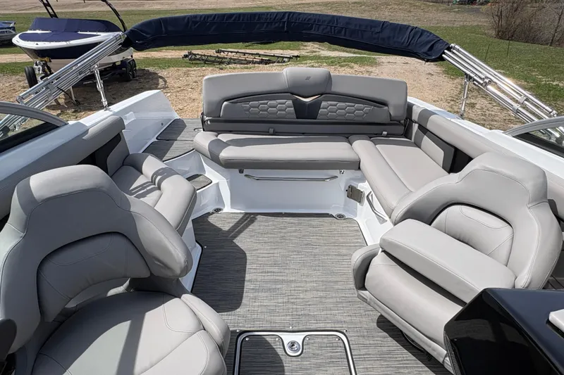 Slide: The Image of 2023 Four Winns HD3 boat interior with luxurious seating and modern design. - 9