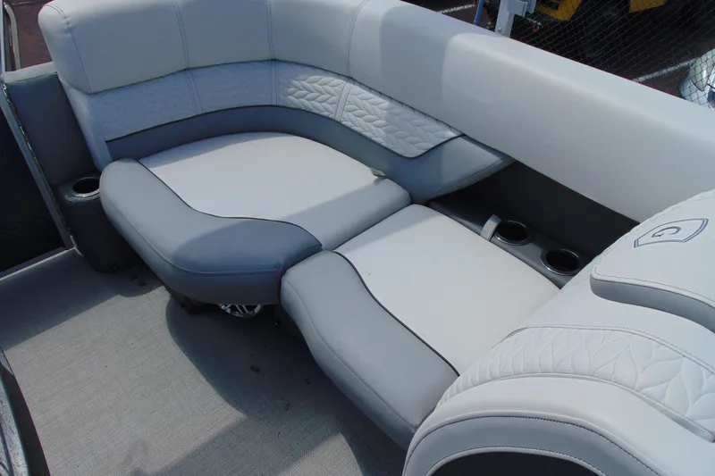 Slide: The Image of Luxurious seating on 2020 Godfrey Monaco 235 SB pontoon boat with cup holders. - 14