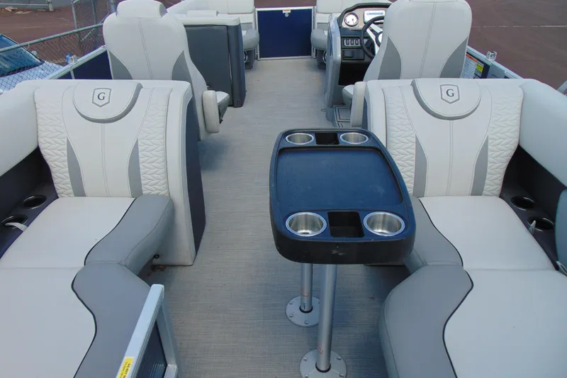 Slide: The Image of Interior of 2020 Godfrey Monaco 235 SB pontoon boat with seating and table. - 17