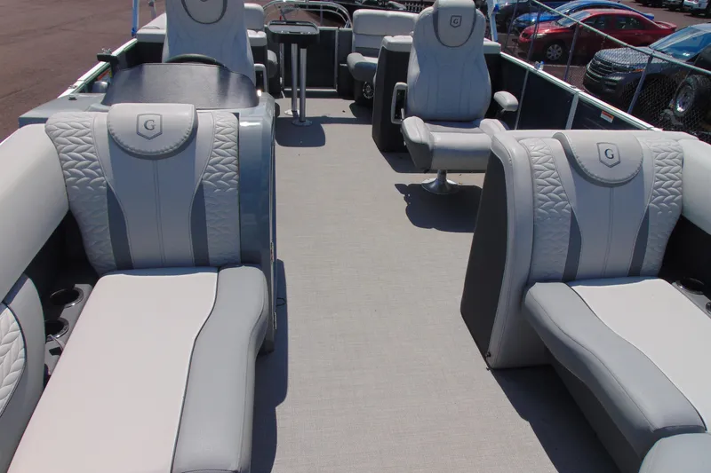 Slide: The Image of 2020 Godfrey Monaco 235 SB pontoon boat interior with luxurious seating and modern design. - 4