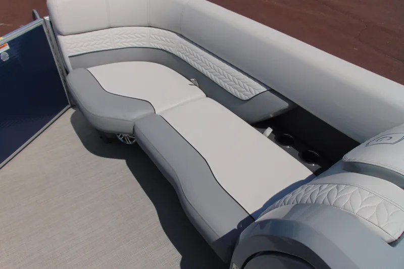 Slide: The Image of Luxurious seating on 2020 Godfrey Monaco 235 SB pontoon boat, featuring elegant upholstery. - 7