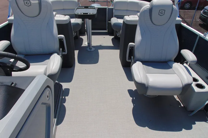 Slide: The Image of 2020 Godfrey Monaco 235 SB boat interior with plush seating and modern design. - 8