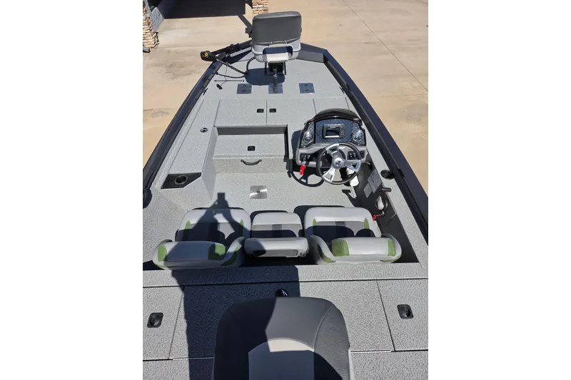 Slide: The Image of 2022 G3 Sportsman 1710 boat interior with steering console and seating. - 12