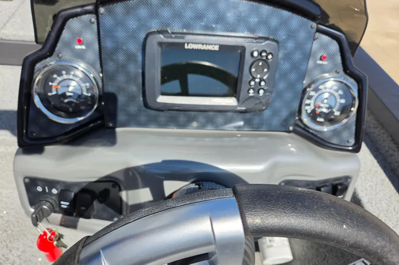 Slide: The Image of 2022 G3 Sportsman 1710 dashboard with Lowrance display and gauges. - 14