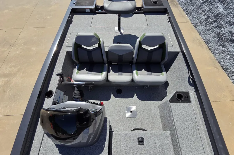 Slide: The Image of 2022 G3 Sportsman 1710 boat interior with seating and steering console. - 18