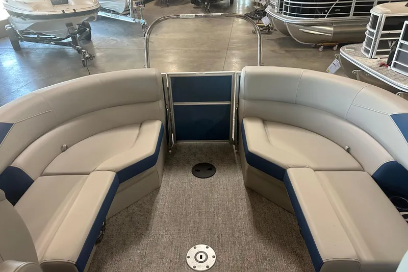 Slide: The Image of Interior of 2025 Trifecta 20RFLE2.75 pontoon boat with plush seating and modern design. - 6