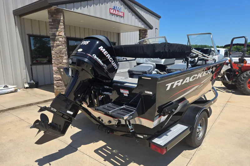 Slide: The Image of 2013 Tracker Pro Guide V-175 Combo boat with Mercury engine at dealership. - 11