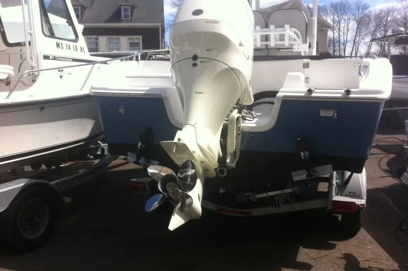 Slide: The Image of 2019 Sea Pro 239 Center Console boat with outboard motor on trailer. - 5