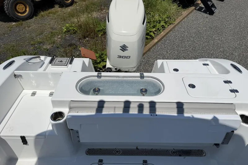 Slide: The Image of 2019 Sea Pro 239 Center Console boat with Suzuki 300 engine, featuring livewell and seating. - 5