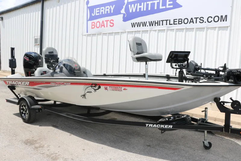 Slide: The Image of 2018 Tracker Pro Team 195 TXW 40th Anniversary Edition boat on trailer at dealership. - 10