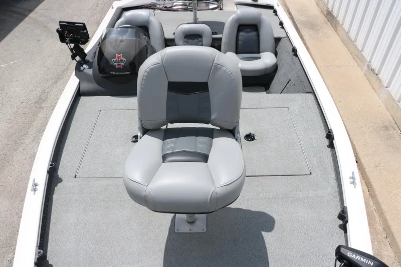 Slide: The Image of 2018 Tracker Pro Team 195 TXW 40th Anniversary Edition boat interior with gray seating. - 20