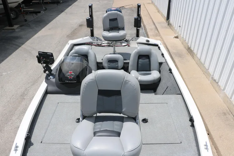 Slide: The Image of 2018 Tracker Pro Team 195 TXW 40th Anniversary Edition boat with gray seating. - 21