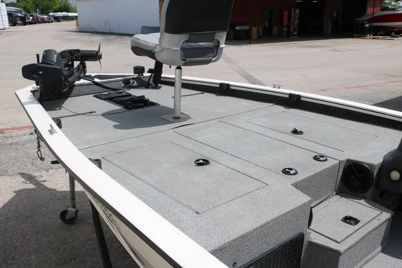 Slide: The Image of 2018 Tracker Pro Team 195 TXW 40th Anniversary Edition boat deck with seating and equipment. - 23