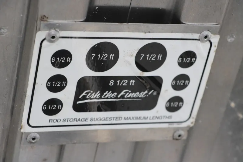 Slide: The Image of Rod storage length guide on 2018 Tracker Pro Team 195 TXW boat. - 32