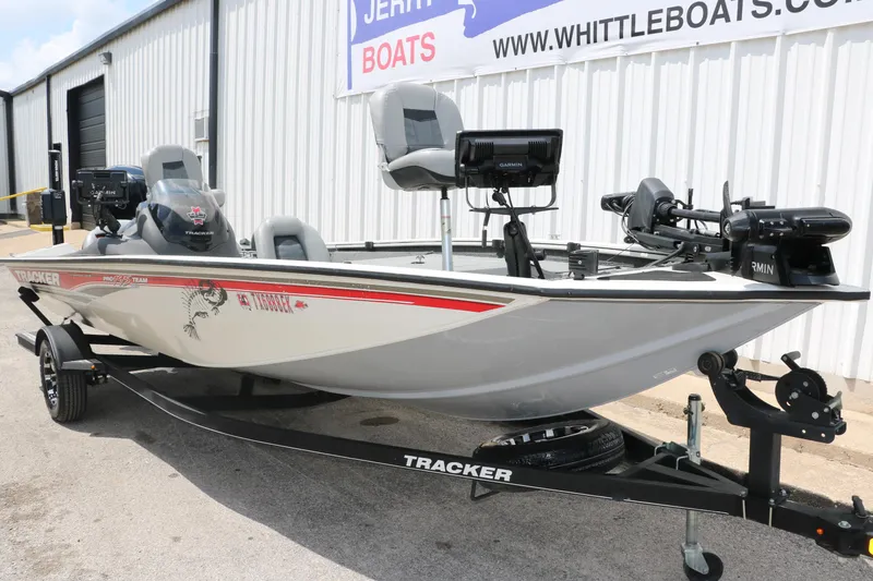 Slide: The Image of 2018 Tracker Pro Team 195 TXW 40th Anniversary Edition boat on trailer. - 9