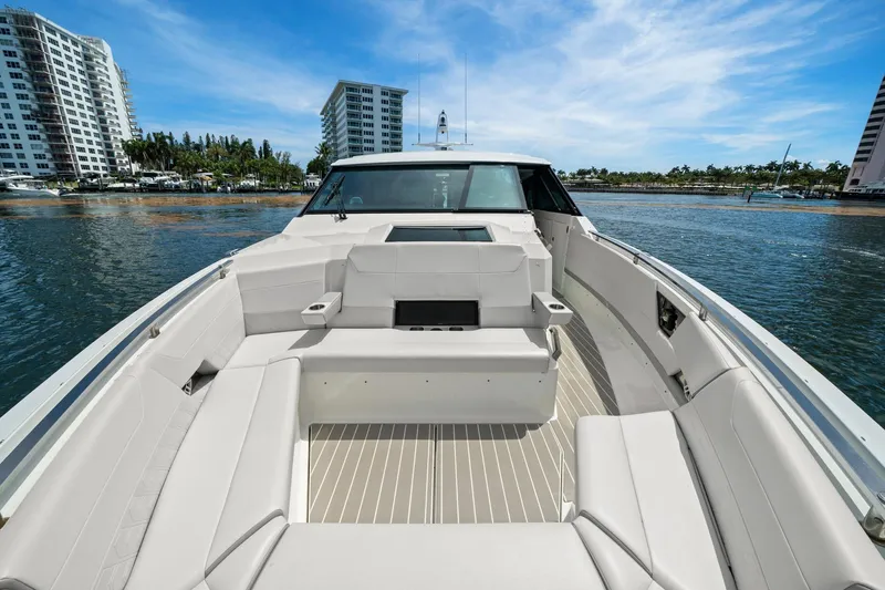 Slide: The Image of 2025 Formula 500 Super Sport Crossover boat on water, featuring luxurious seating and modern design. - 15